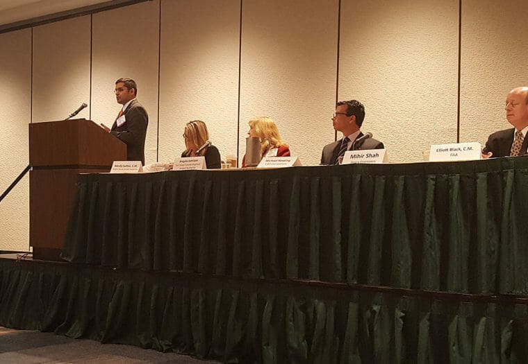 Mihir Speaks at Symposium