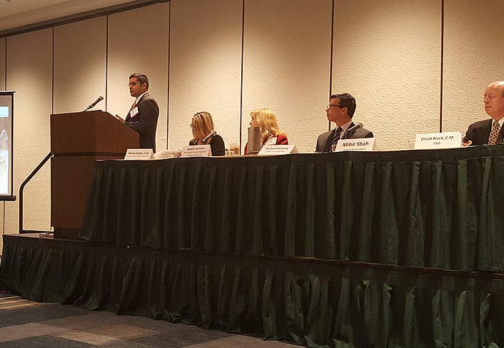 Mihir Speaks at Symposium